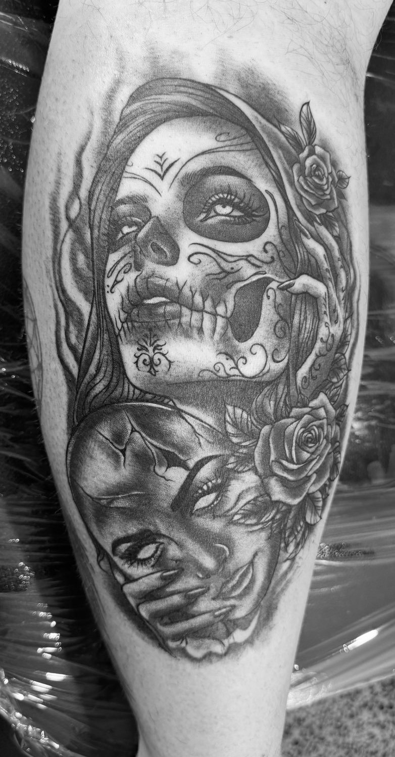 Black and grey sugar-skull woman tattoo
